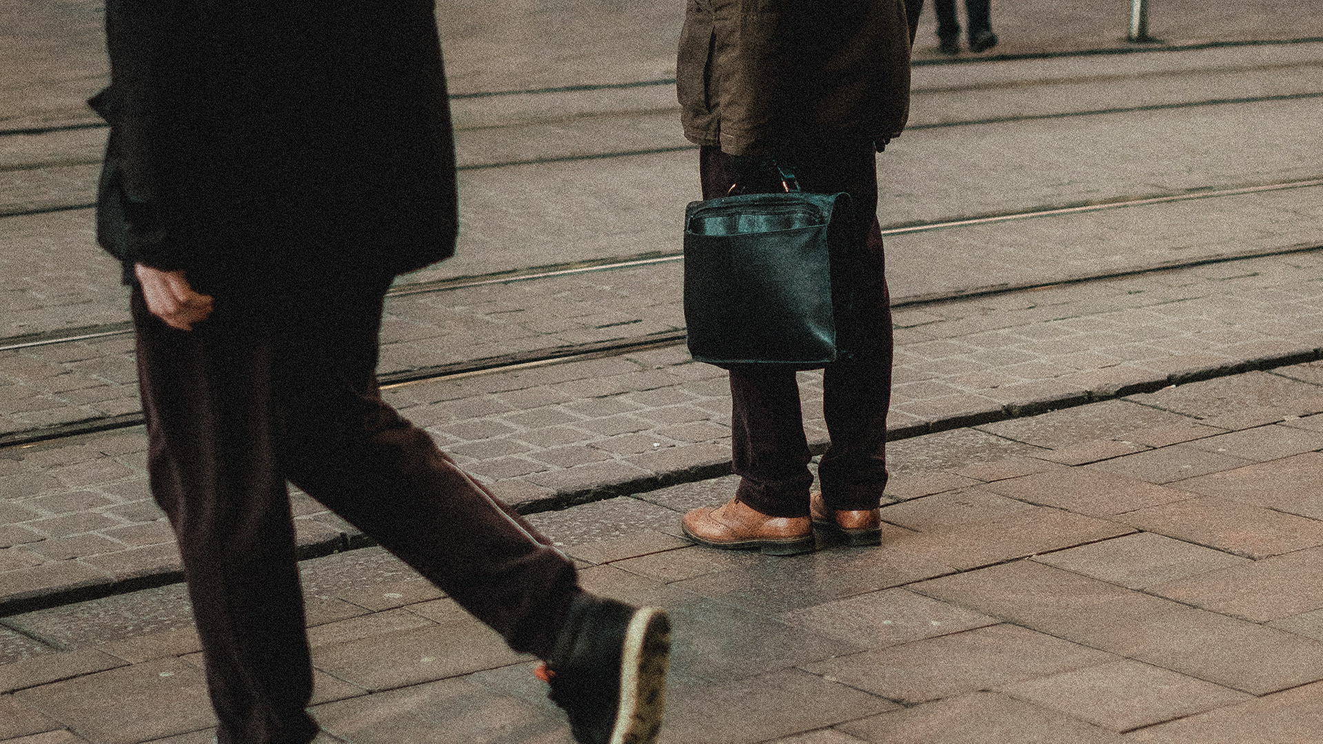 A person waiting for tram